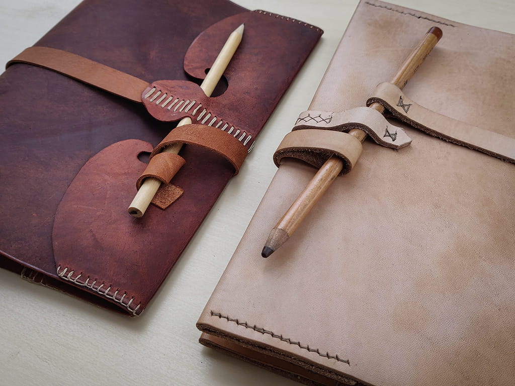 Leather diary covers made on a course at Tharwa Valley Forge