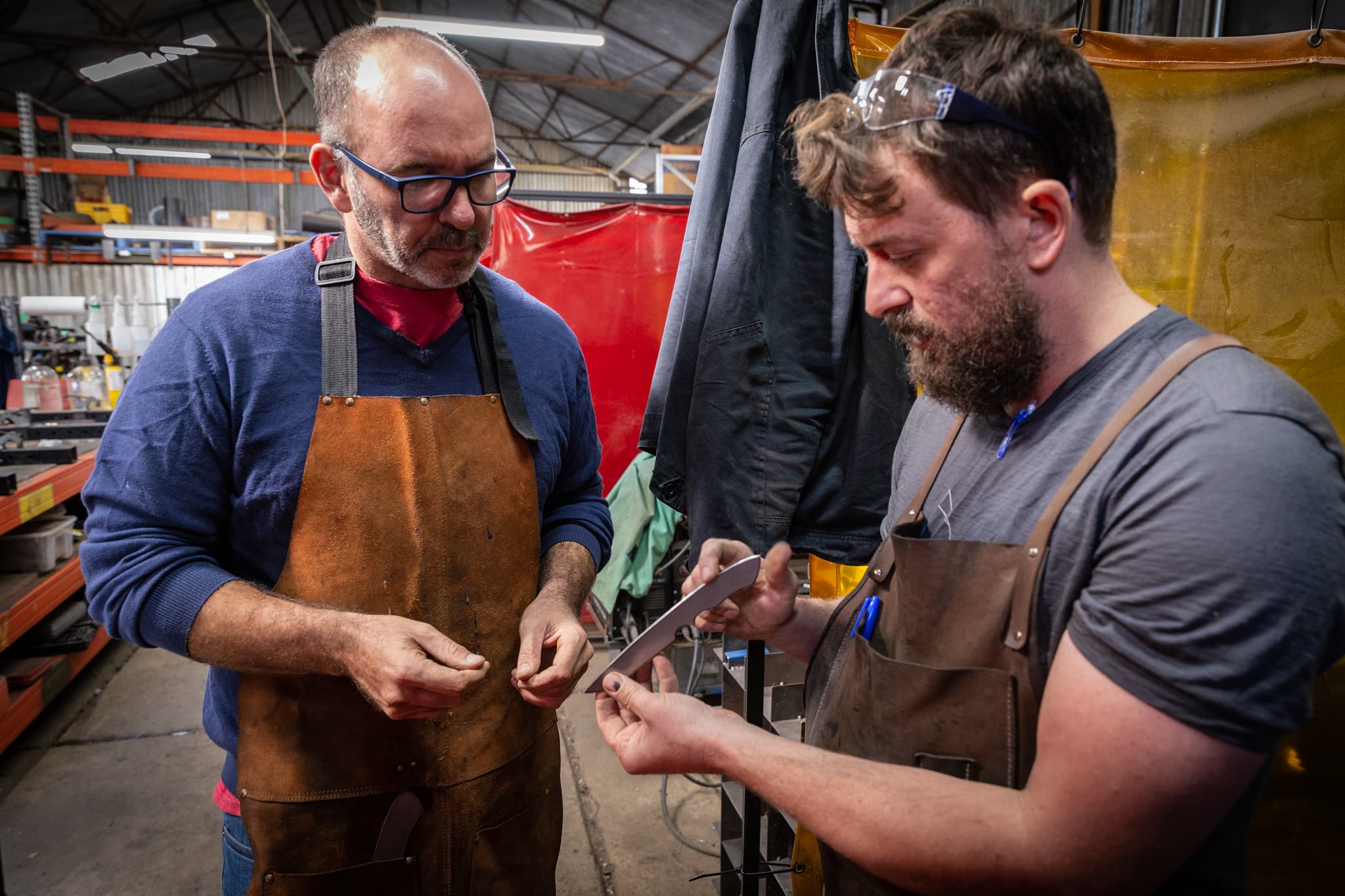 Bladesmith Matthew McVicar teaching a student how to make a knife